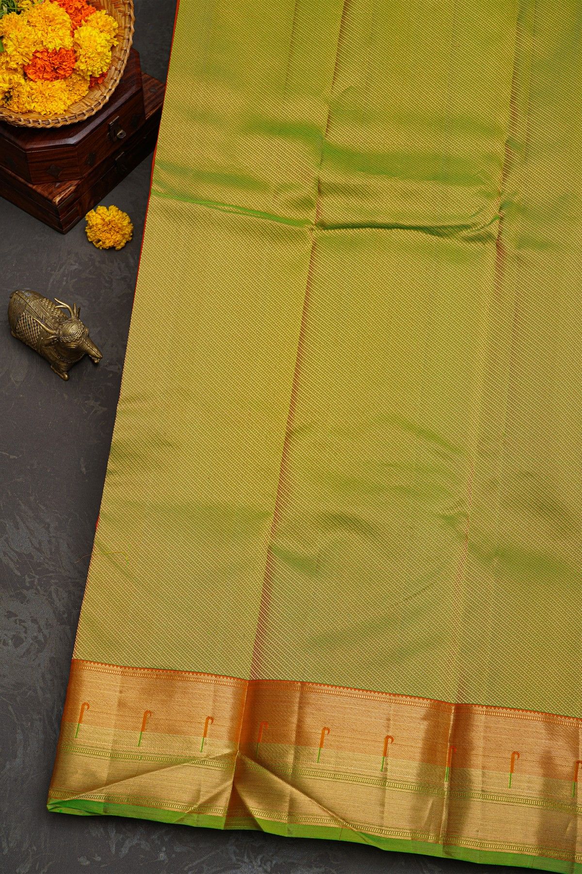Kancheepuram Silk Orange Saree With Muniya Buttis Border