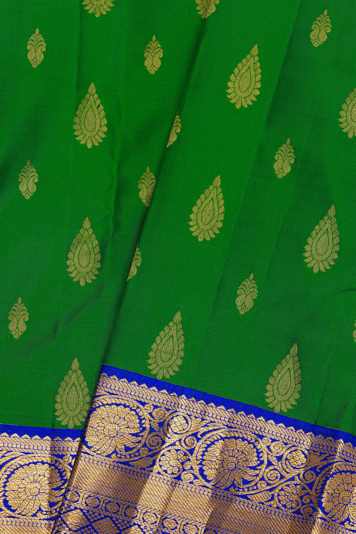 Kancheepuram Silk Bottle Green Saree With Florals And Leaves Jaal Border