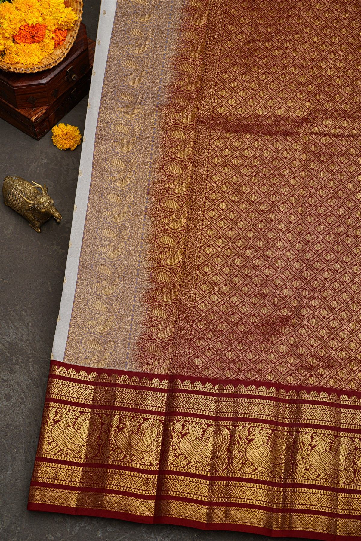 Kancheepuram Silk Off White Saree With Florals And Buttis Maroon Border