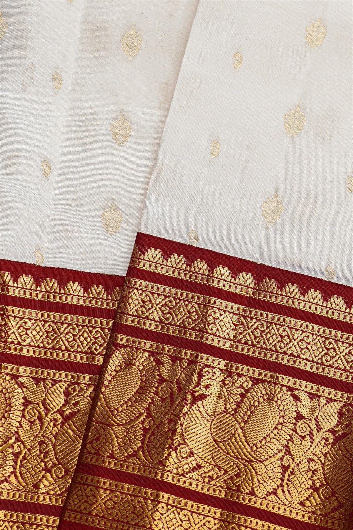 Kancheepuram Silk Off White Saree With Florals And Buttis Maroon Border
