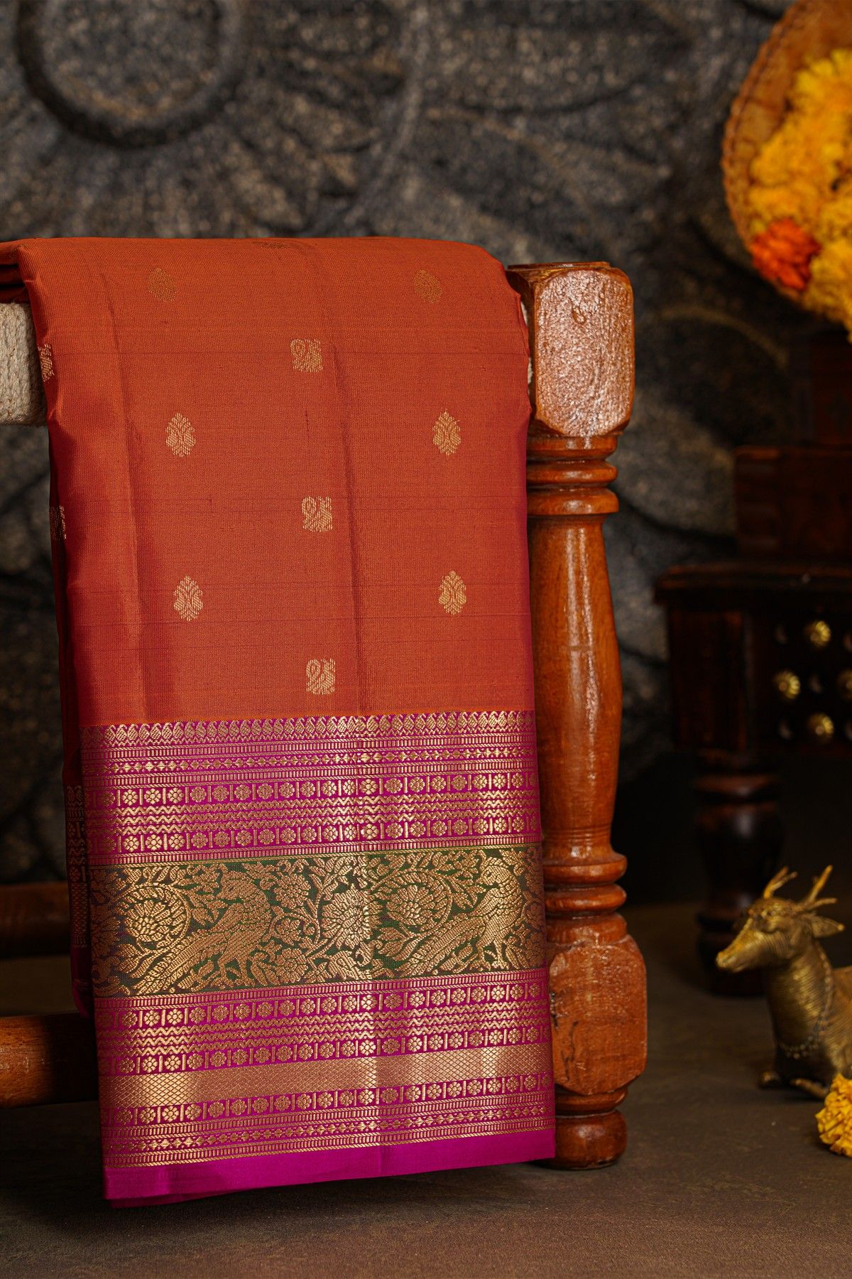 Kancheepuram Silk Rust Orange Saree With Florals And Leaves Jaal With Peacocks Border