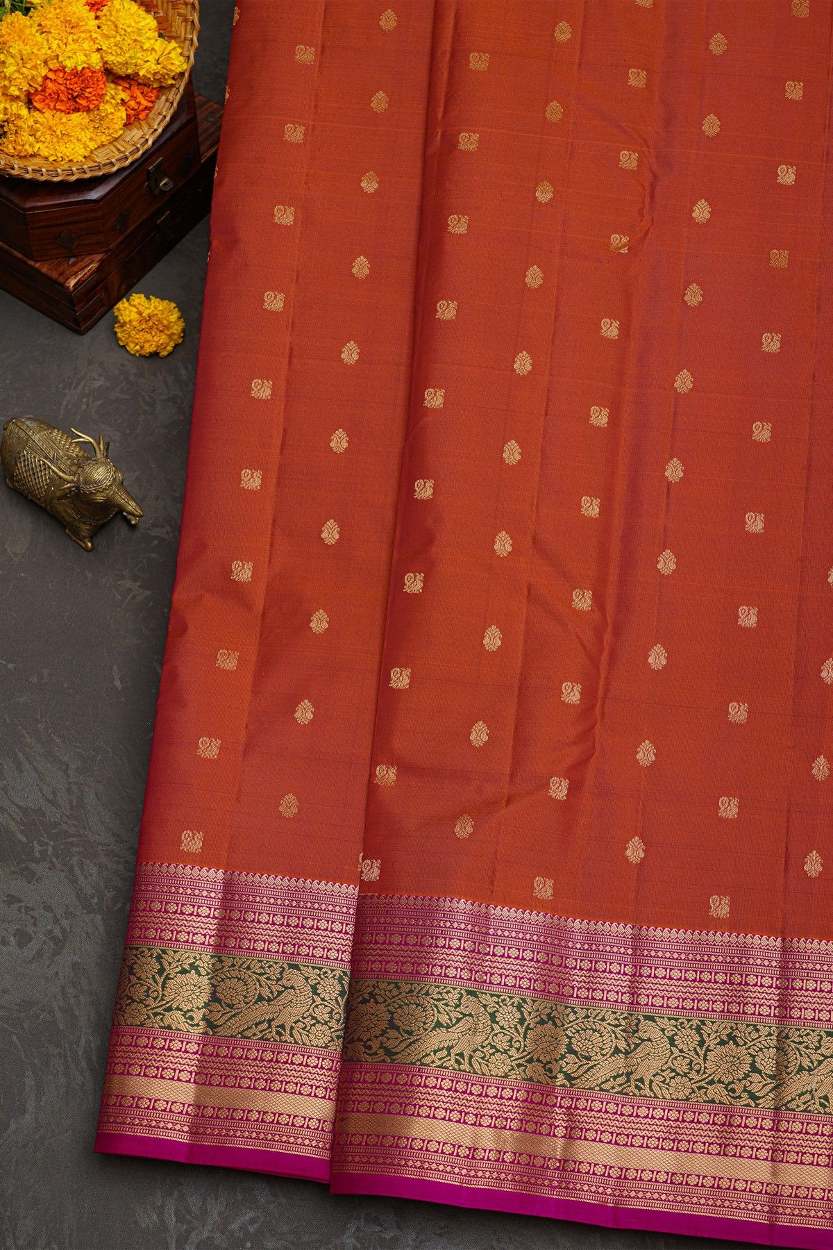 Kancheepuram Silk Rust Orange Saree With Florals And Leaves Jaal With Peacocks Border