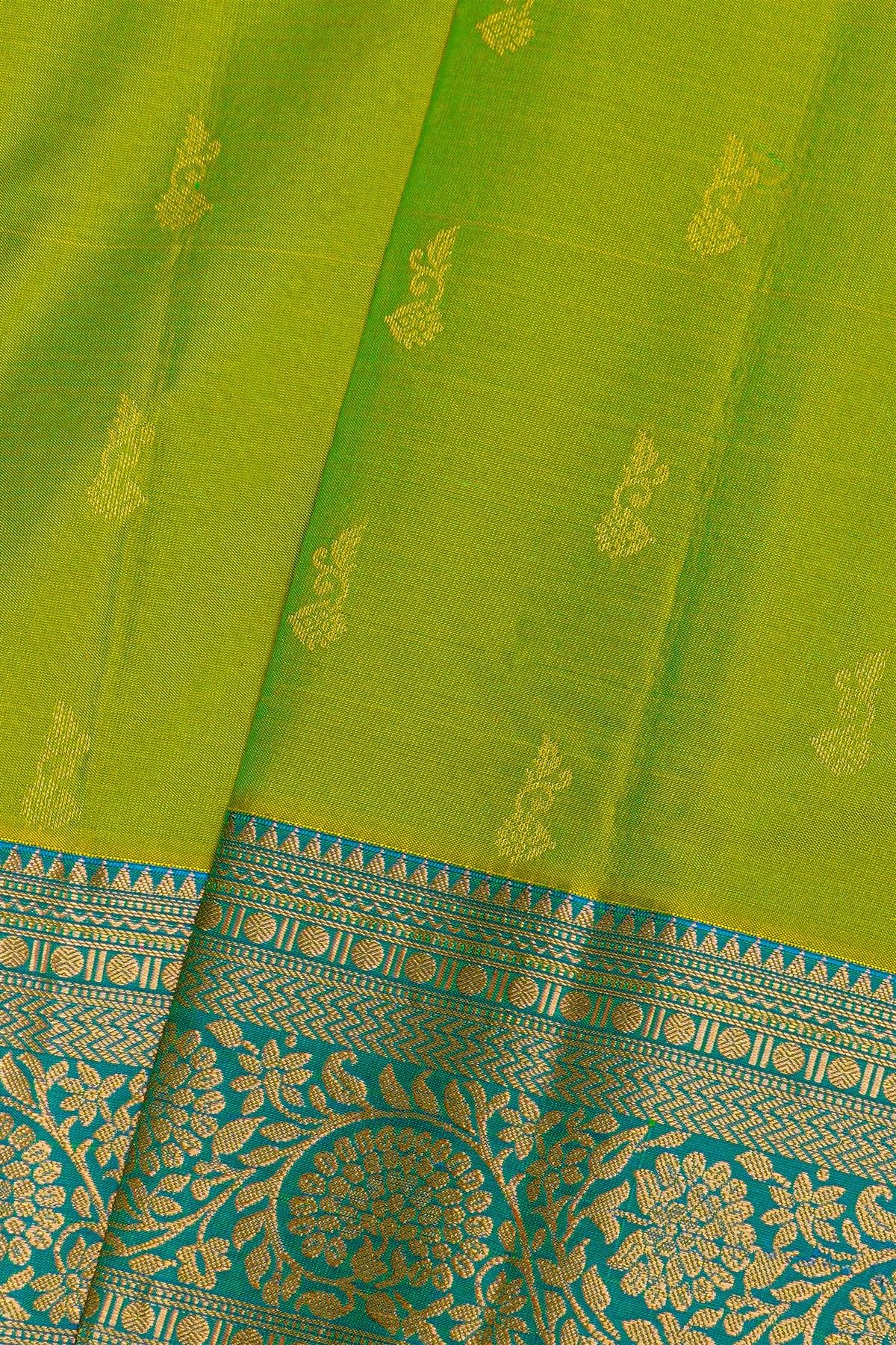 Kancheepuram Silk Parrot Green Saree With Florals And Leaves Jaal Border