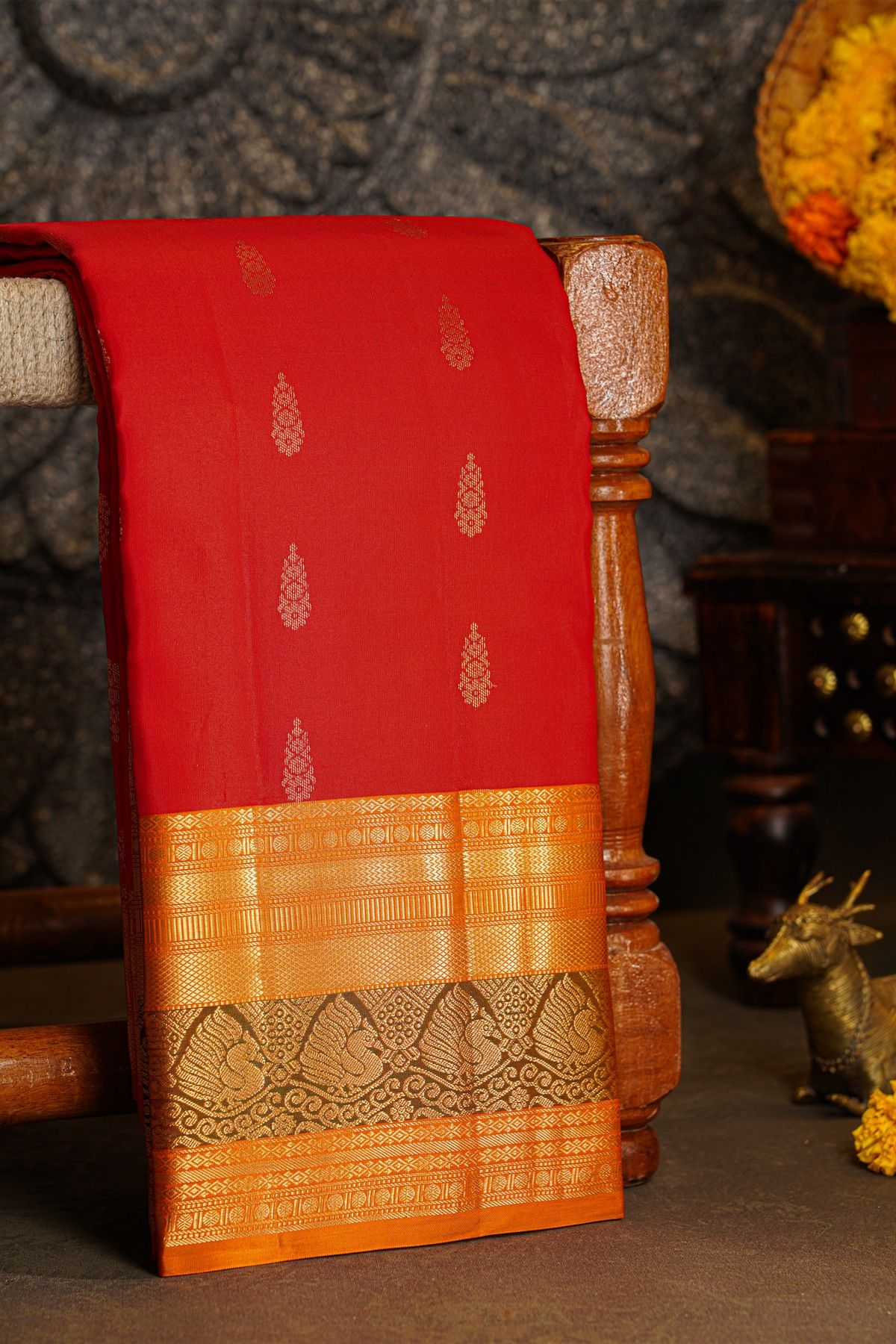 Kancheepuram Silk Red Saree With Florals and Leaves With Peacocks Border