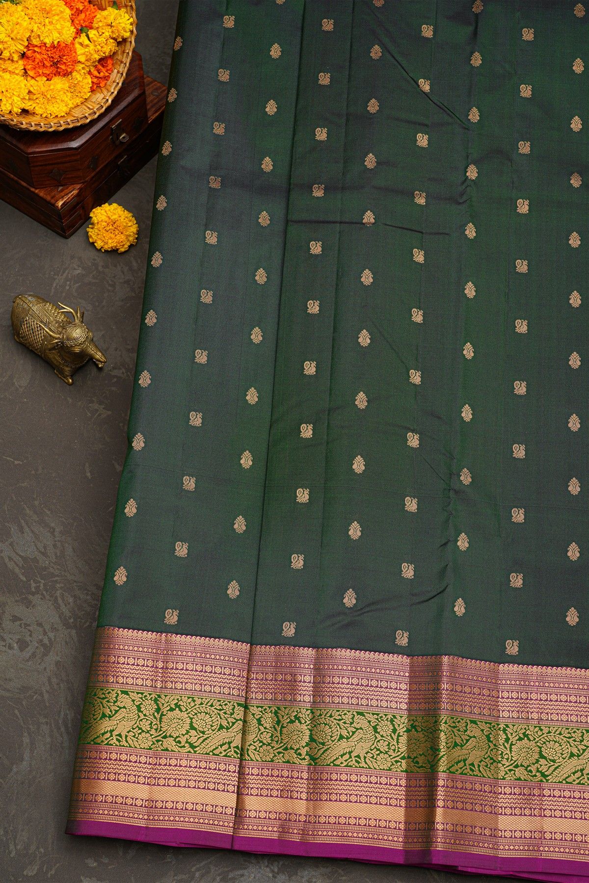 Kancheepuram Silk Bottle Green Saree With Florals And Leaves With Peacocks In Zari Border