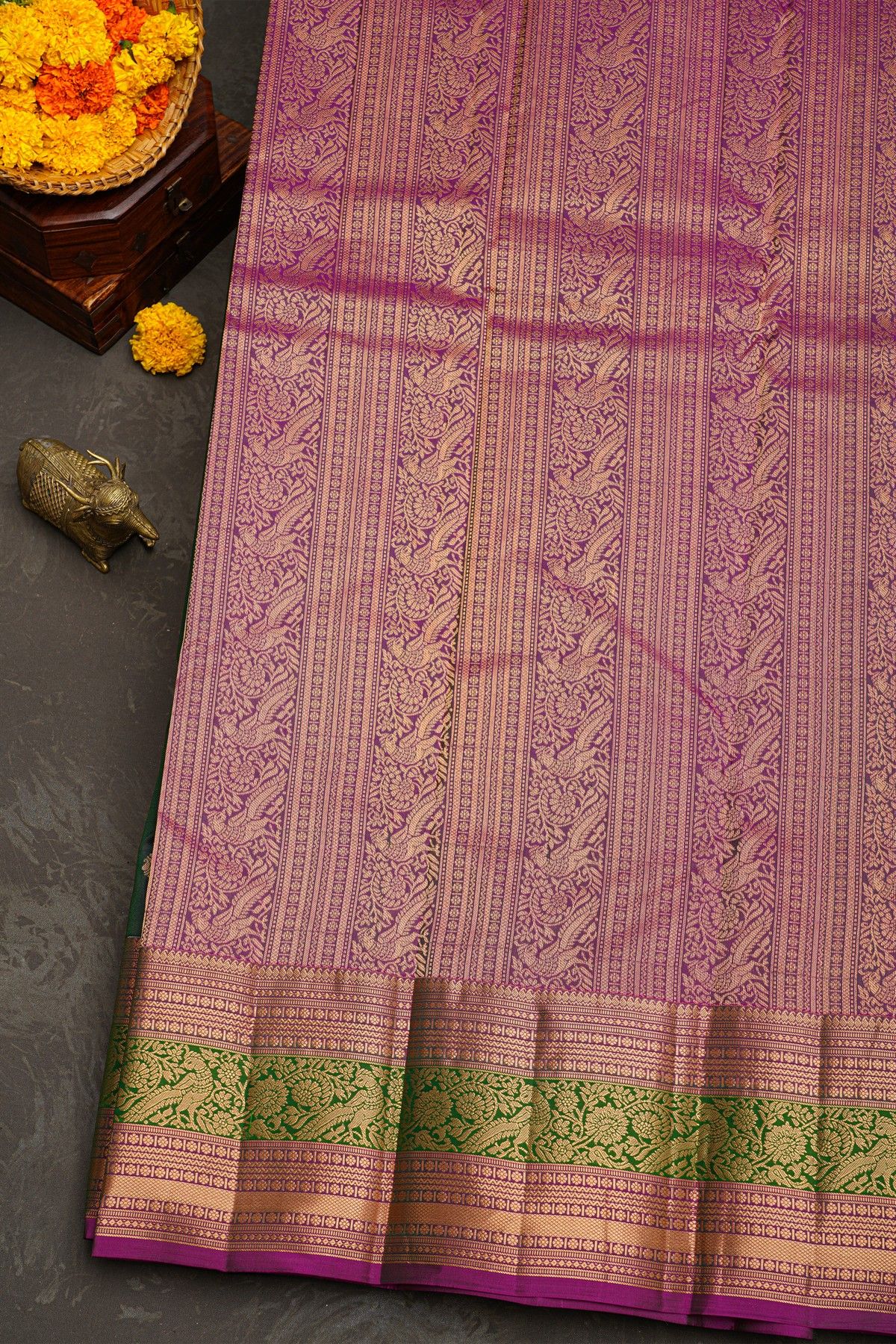 Kancheepuram Silk Bottle Green Saree With Florals And Leaves With Peacocks In Zari Border