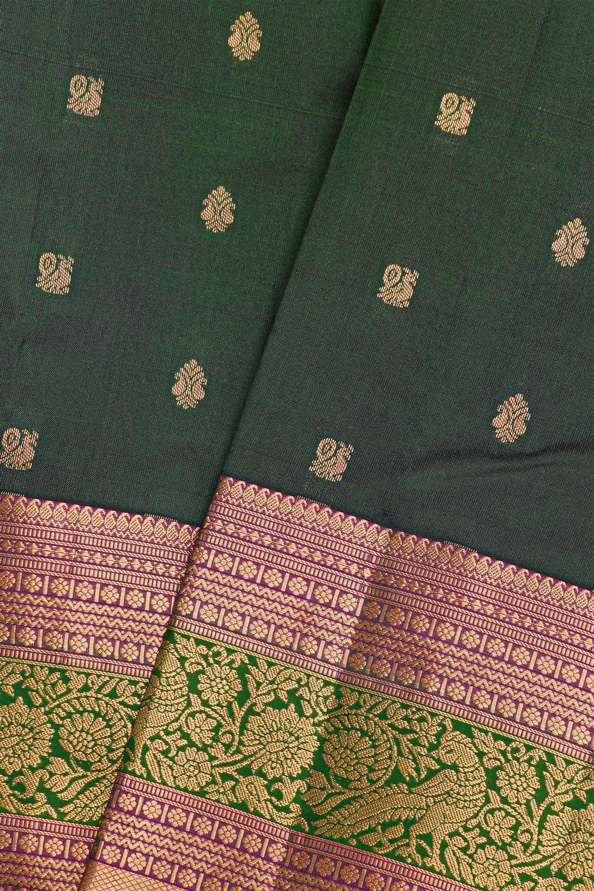 Kancheepuram Silk Bottle Green Saree With Florals And Leaves With Peacocks In Zari Border