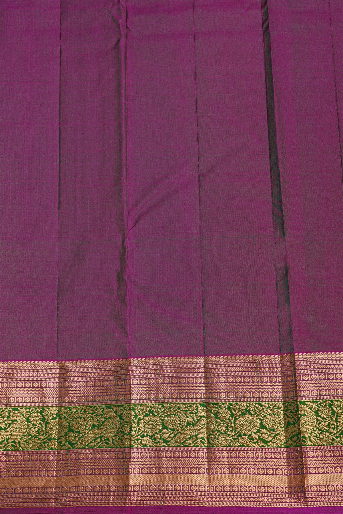Kancheepuram Silk Bottle Green Saree With Florals And Leaves With Peacocks In Zari Border