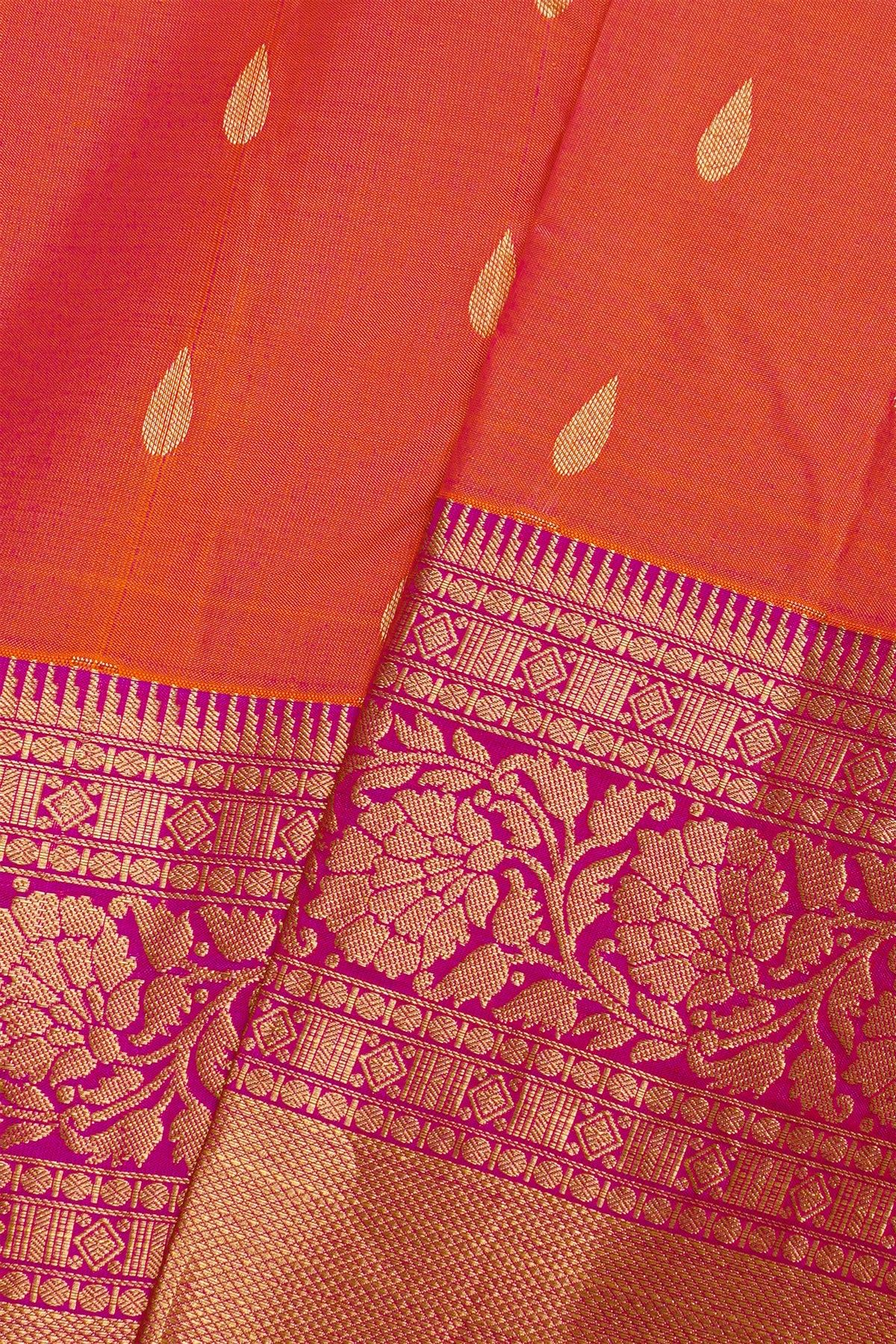 Kancheepuram Silk Peach Saree With Florals And Leaves With Cross Lines Border