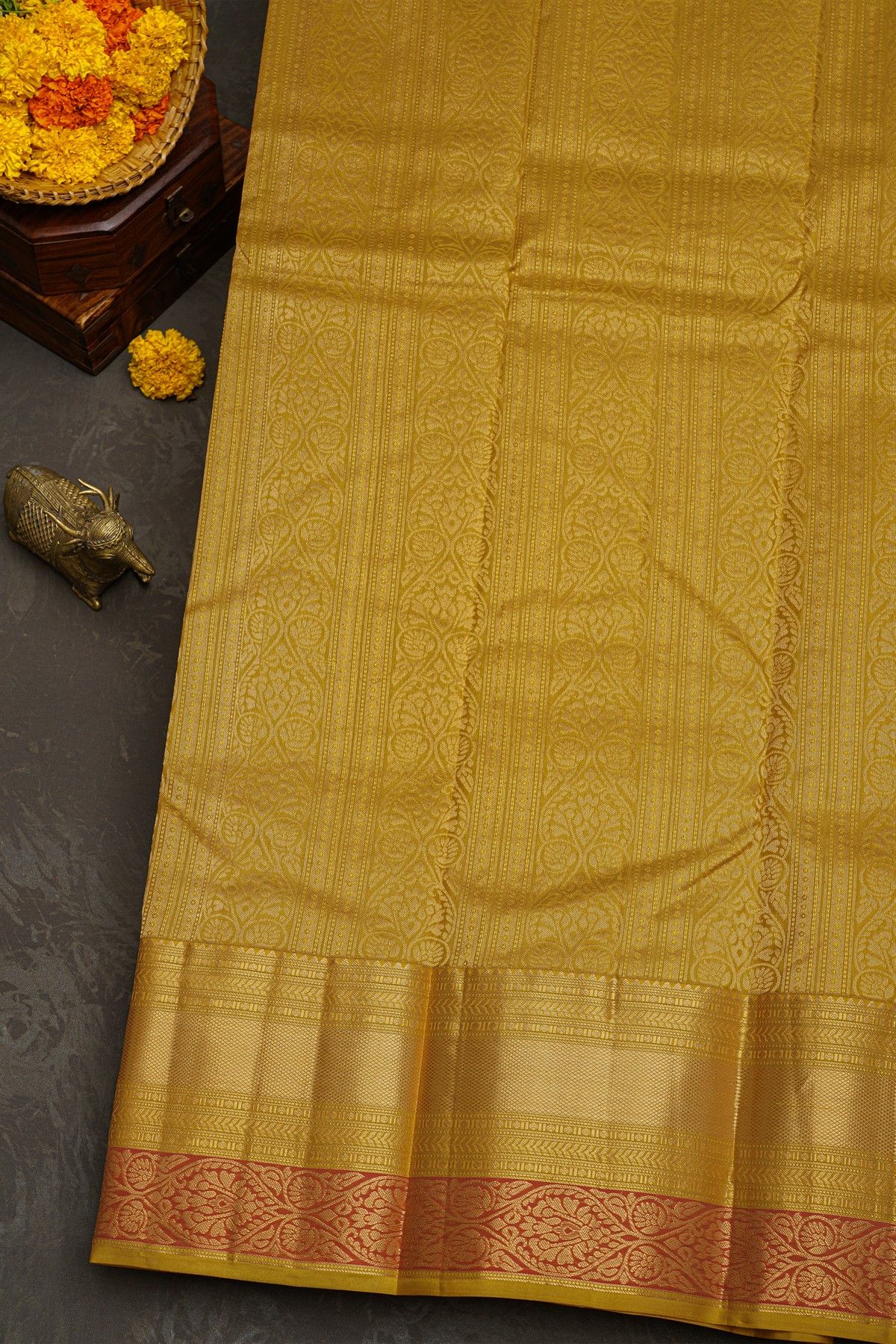 Kancheepuram Silk Cream Saree With Florals And Leaves With Diamonds Border