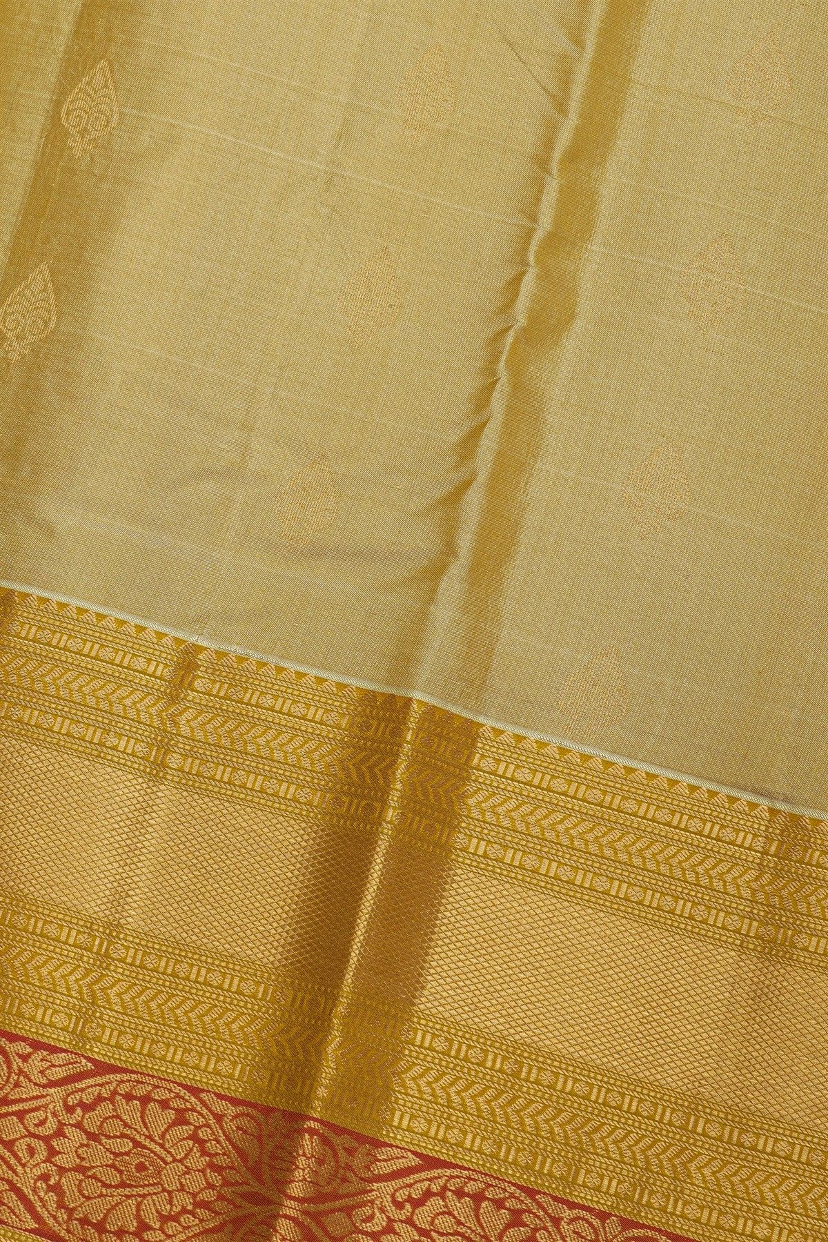 Kancheepuram Silk Cream Saree With Florals And Leaves With Diamonds Border