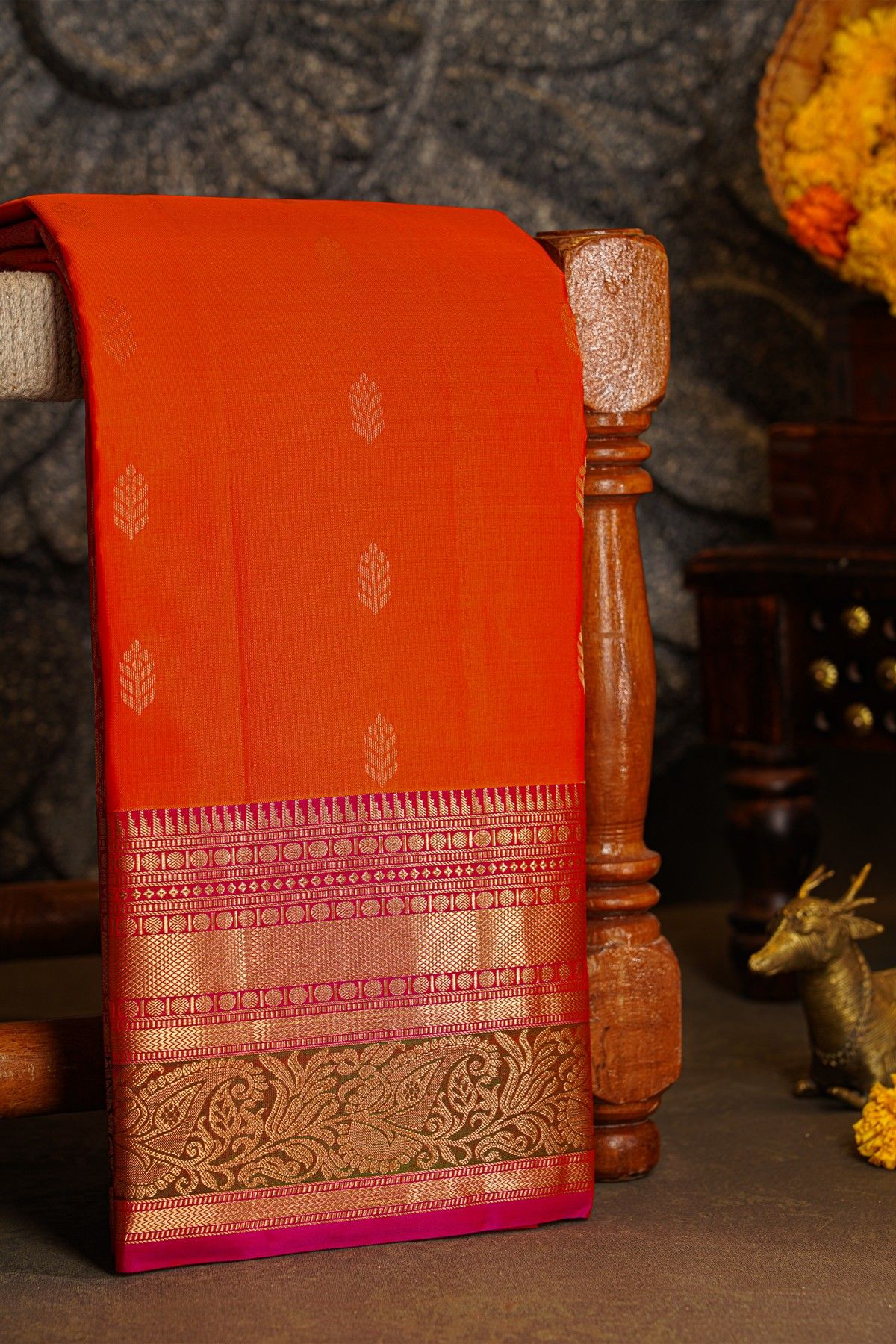 Kancheepuram Silk Peach Saree With Florals And Diamonds In Zari Border