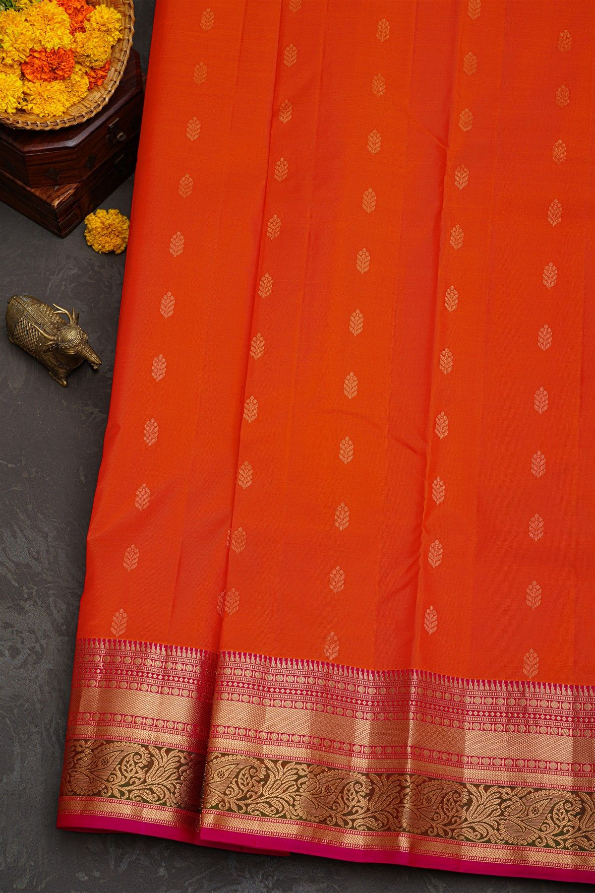 Kancheepuram Silk Peach Saree With Florals And Diamonds In Zari Border