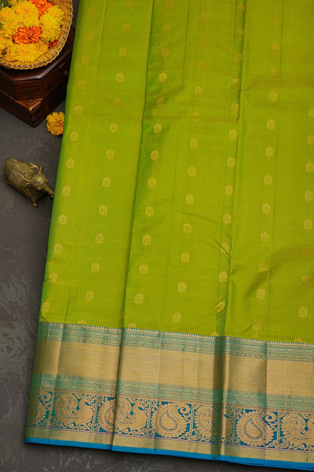 Kancheepuram Silk Green Saree With Florals And Peacocks In Cross Lines Border