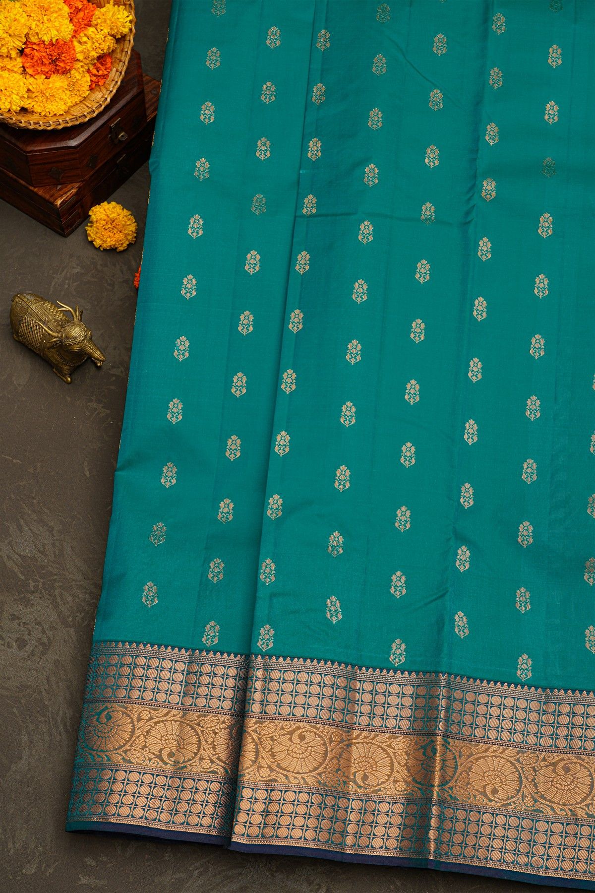 Kancheepuram Silk Teal Blue Saree With Florals And Leaves With Temples Border