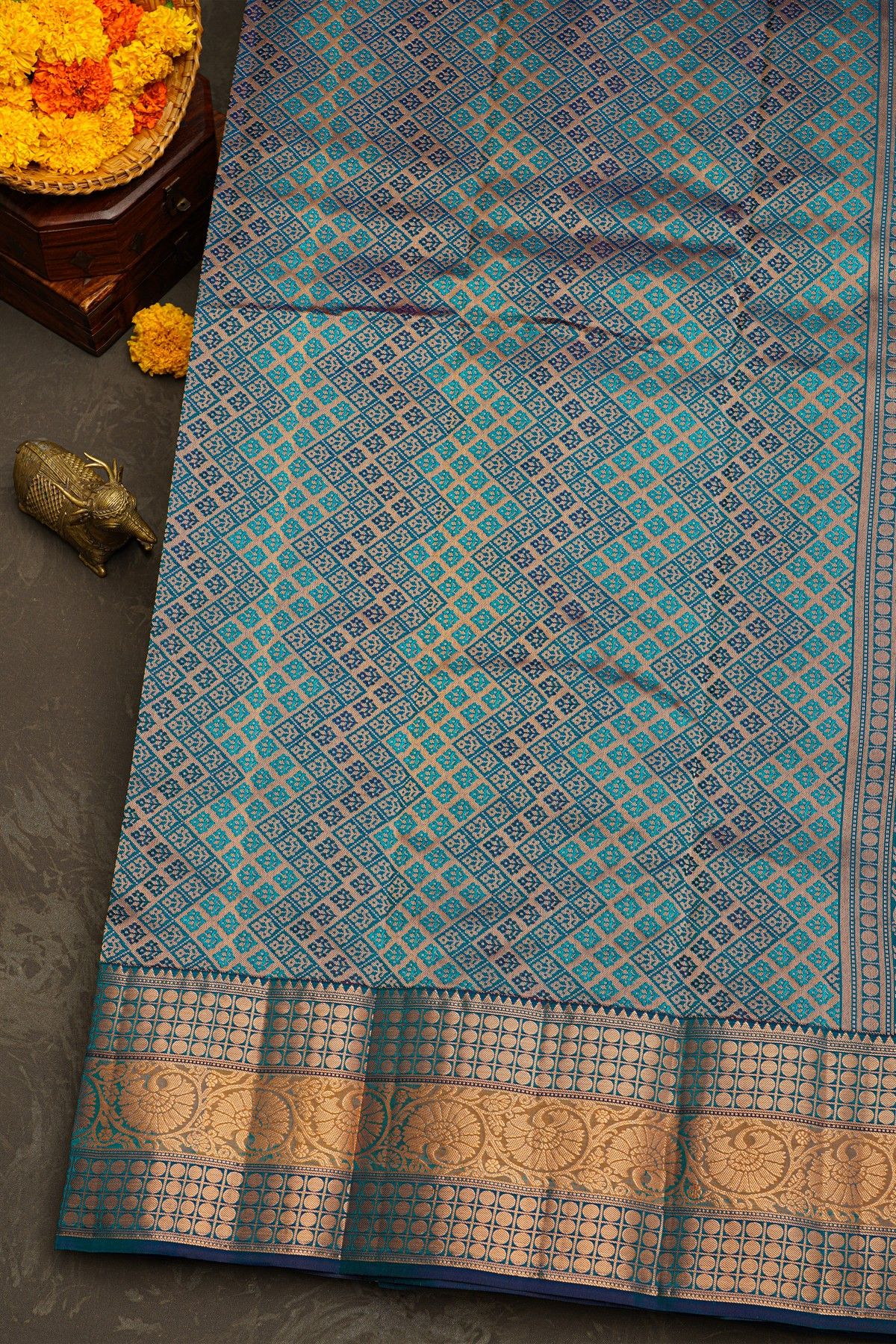 Kancheepuram Silk Teal Blue Saree With Florals And Leaves With Temples Border