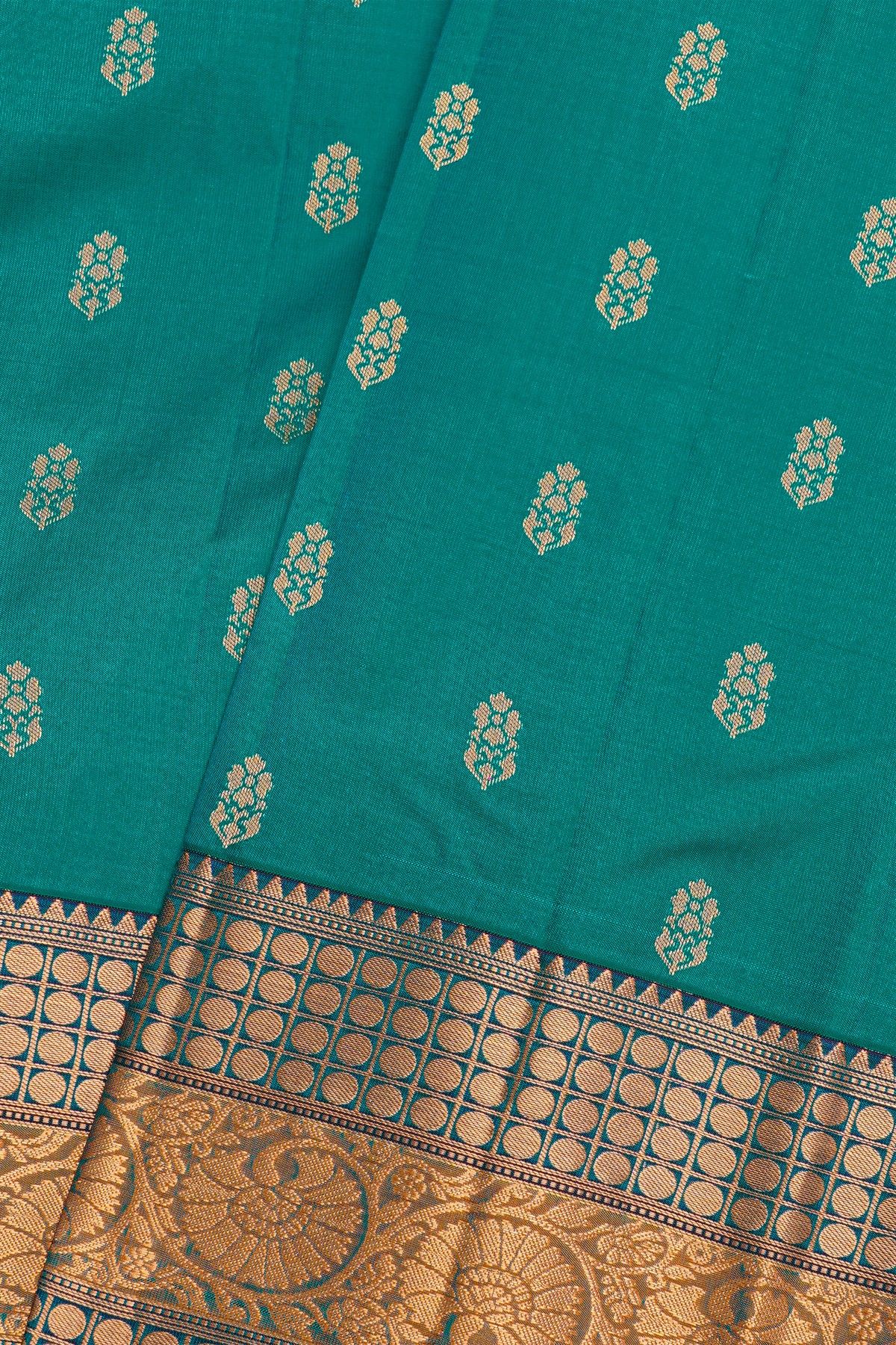 Kancheepuram Silk Teal Blue Saree With Florals And Leaves With Temples Border