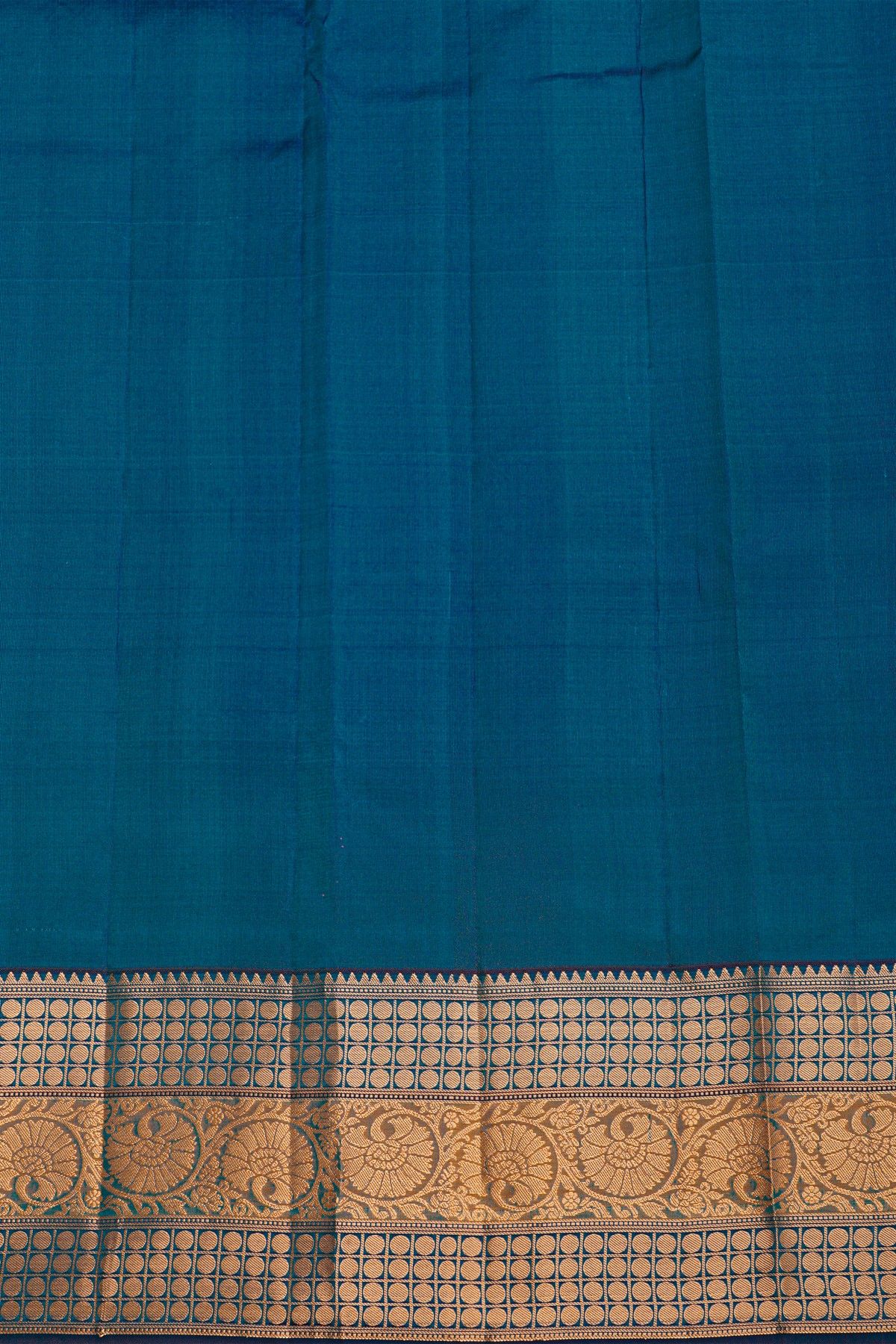 Kancheepuram Silk Teal Blue Saree With Florals And Leaves With Temples Border