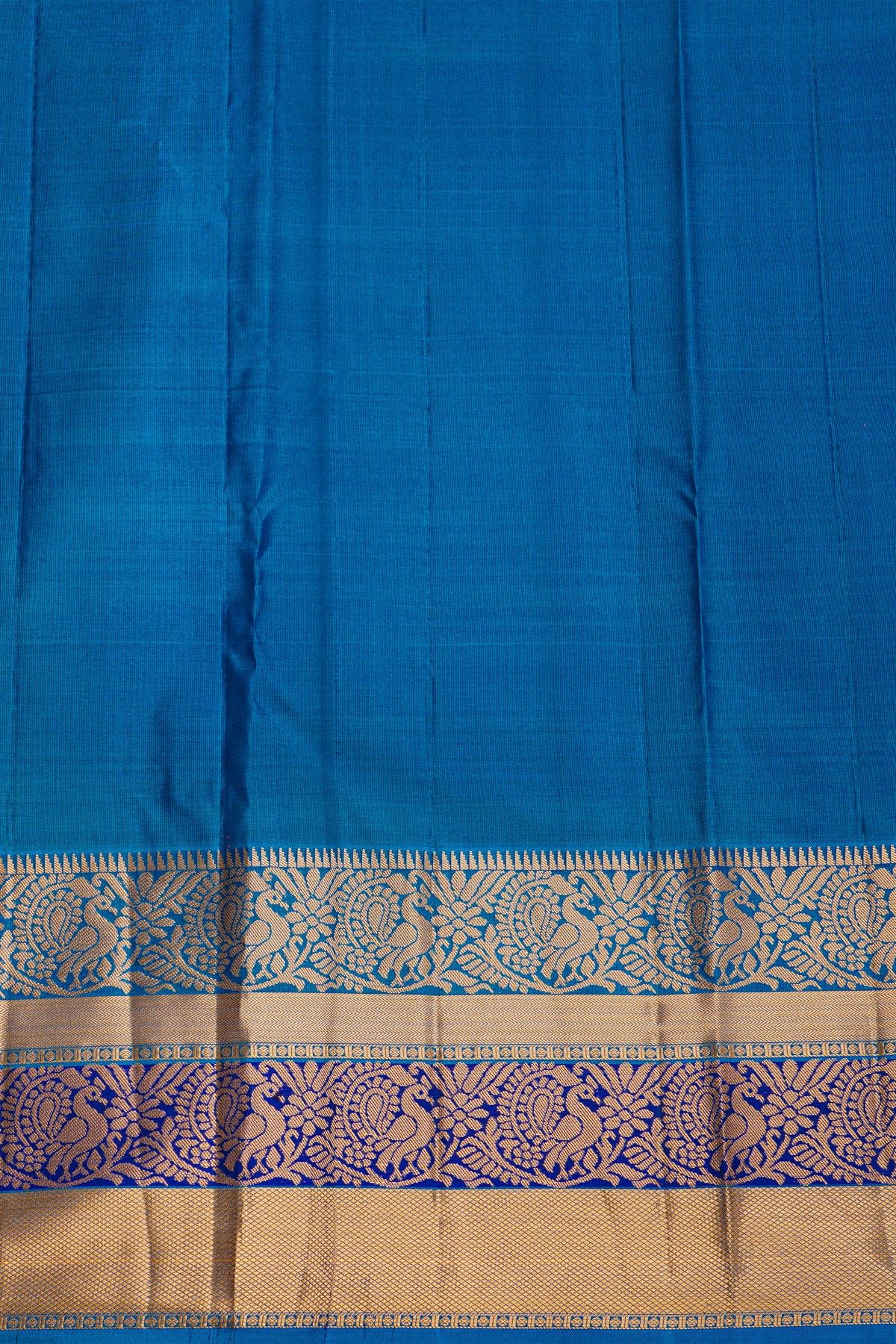 Kancheepuram Silk Purple Saree With Florals And Peacocks In Zari Border