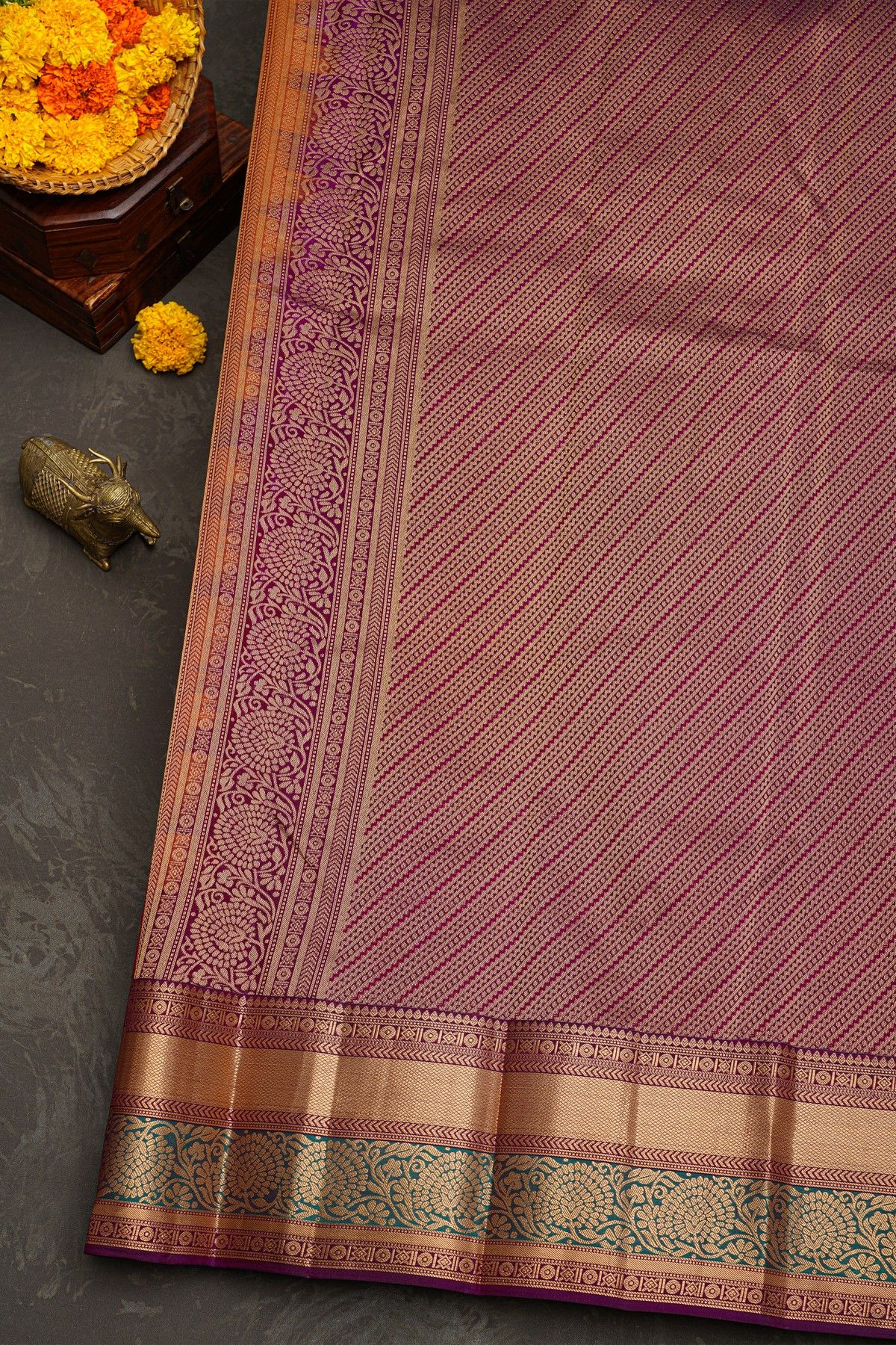 Kancheepuram Silk Rust Saree With Florals And Leaves With Cross Lines Border
