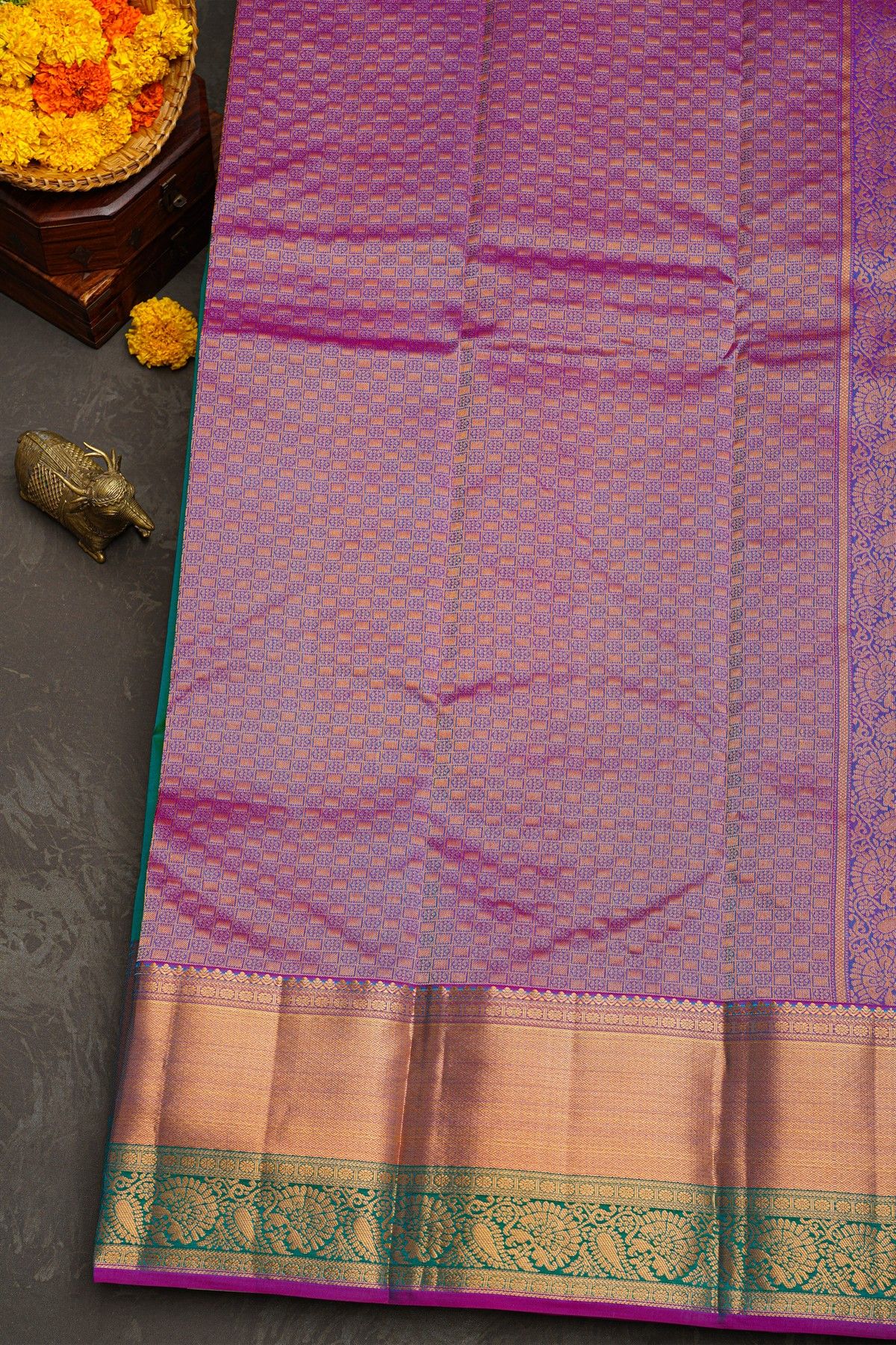 Kancheepuram Silk Peacock Green Saree With Florals And leaves In Cross Lines Border