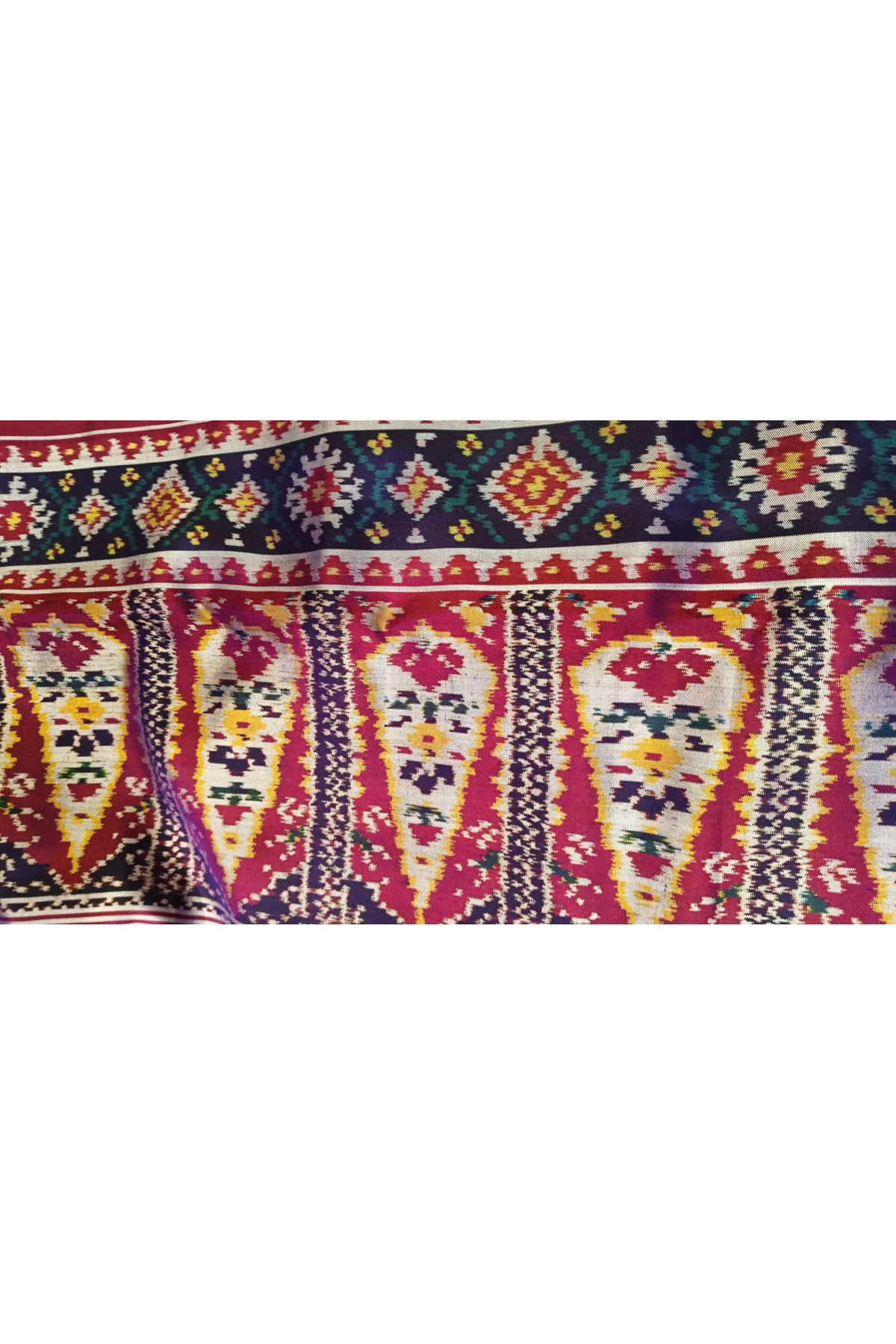 Patola Silk Dark Violet Saree With Florals And Leaves With Birds Body And Self Florals And Leaves Border