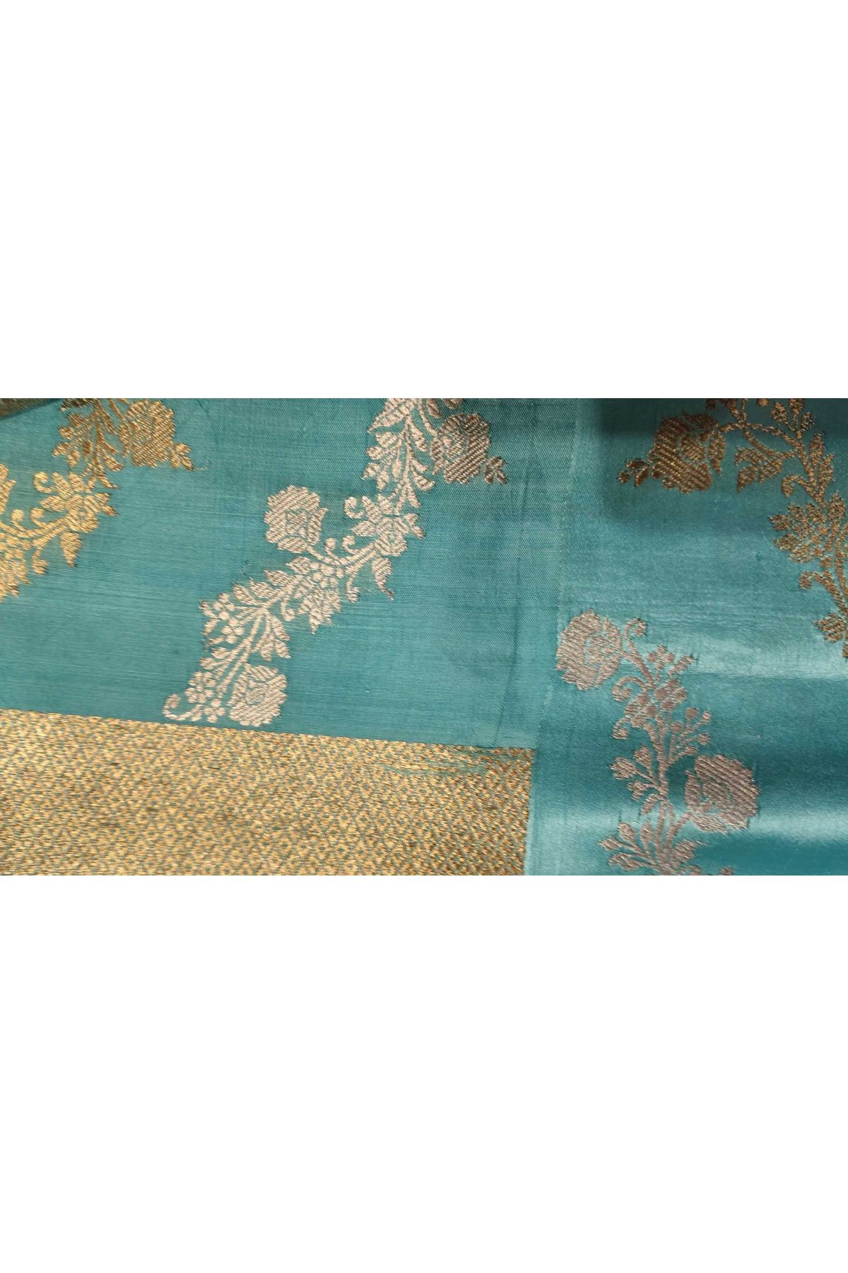 Fancy Matka Silk Peacock Blue Saree With Florals And Buttis Body And Contrast Florals And Leaves Border