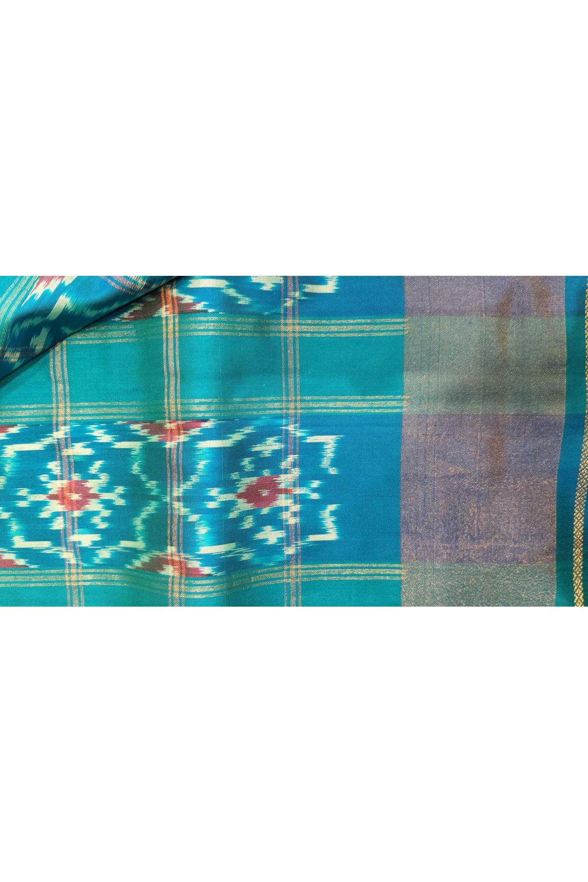 Pochampally Ikat Silk Sky Blue Saree With Floral And Butti In Checks Body