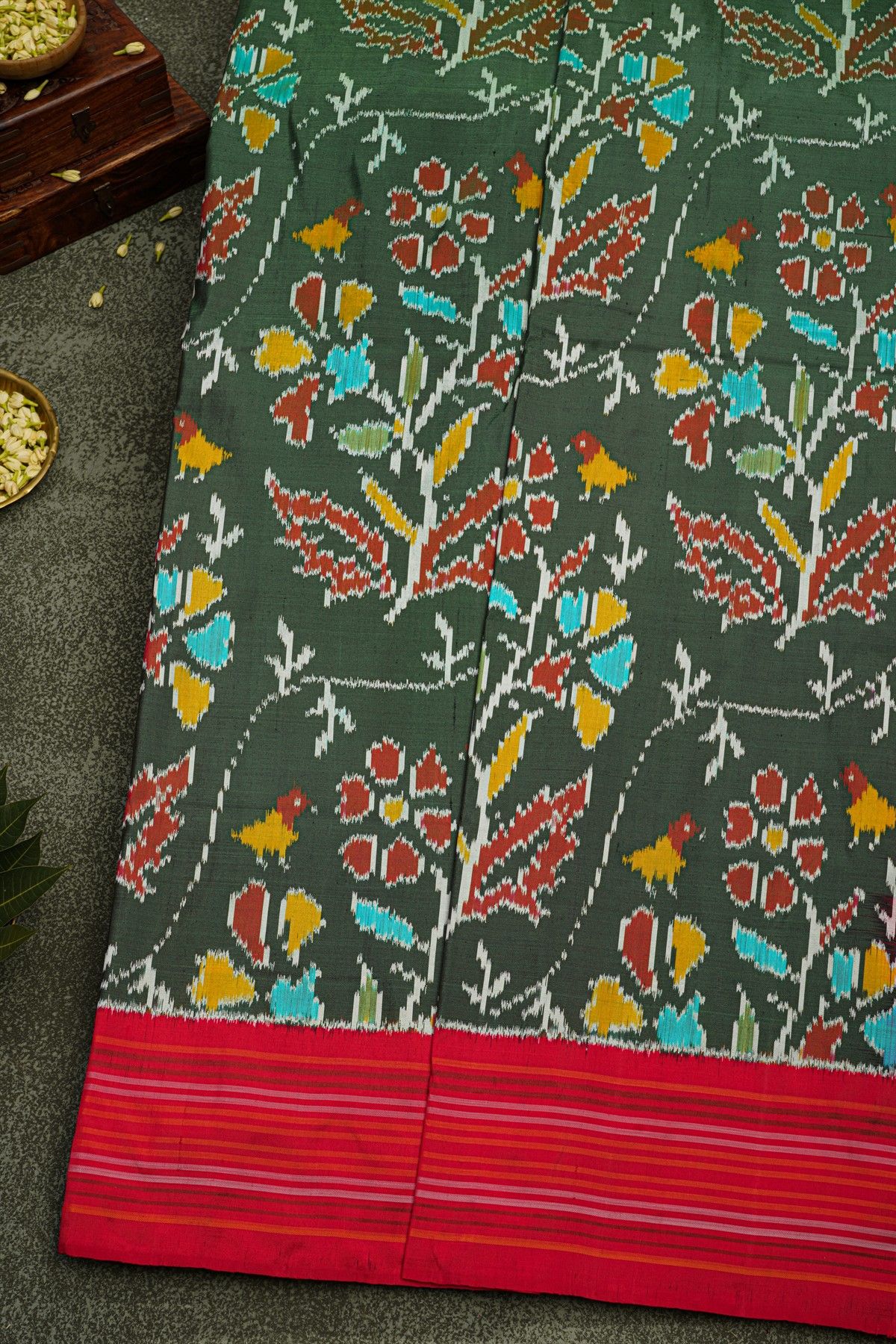 Ikat Silk Bottle Green Saree