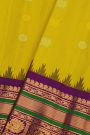 Gadwal Silk Yellow Saree With Peacock And Floral Buttis Body