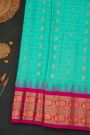 Gadwal Silk Mint Green Saree With Floral Jaal And Peacock Border