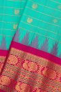 Gadwal Silk Mint Green Saree With Floral Jaal And Peacock Border