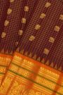 Gadwal Silk Maroon Saree With Elephants And Peacocks Buttis In Checks Body