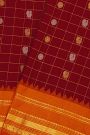 Gadwal Silk Maroon Saree With Florals In Zari Checks And Contrast Border