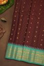 Gadwal Silk Maroon Saree With Florals And Peacocks In Zari Checks