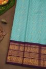 Gadwal Silk Sky Blue Saree With Rudraksha Buttis Body And Peacock Buttis Contrast Border