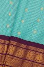 Gadwal Silk Sky Blue Saree With Rudraksha Buttis Body And Peacock Buttis Contrast Border