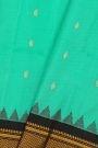 Gadwal Silk Turquoise Blue Saree With Buttis Body And Contrast Kaddi Border
