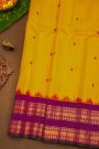 Gadwal Silk Yellow Saree With Buttis Body And Contrast Mango Paisley Border