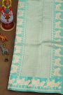 Fancy Matka Silk Sky Blue Saree With Floral Buttis Body And Pichwai Cows Motifs Border