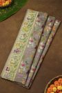 Banarasi Kora Grey Saree With Florals And Human Motifs Border