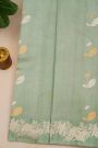 Fancy Matka Silk Sage Green Saree With Florals And Buttis Body And Self Florals And Leaves Border