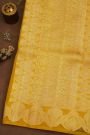 Fancy Organza Yellow Saree With Florals And Buttis Body And Self Florals And Leaves Border