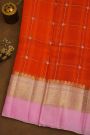 Fancy Organza Orange Saree With Checks And Buttis Body And Contrast Florals And Leaves Border