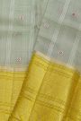 Fancy Kora Grey Saree With Checks And Floral Buttis Body