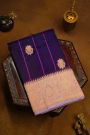 Fancy Organza Purple Saree With Zari Lines And Buttis Body And Contrast Florals And Leaves Border