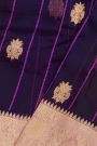 Fancy Organza Purple Saree With Zari Lines And Buttis Body And Contrast Florals And Leaves Border