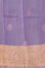 Fancy Organza Purple Saree With Zari Lines And Buttis Body And Contrast Florals And Leaves Border