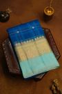 Fancy Organza Royal Blue Saree With Checks And Florals Body And Contrast Florals And Leaves Border