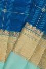 Fancy Organza Royal Blue Saree With Checks And Florals Body And Contrast Florals And Leaves Border